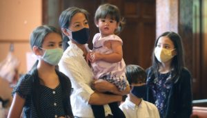 a family attends mass