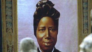 Heilige Josephine Bakhita, antikes Bild an der Fassade des Petersdoms.